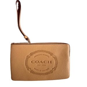 Brand new Coach wristlet